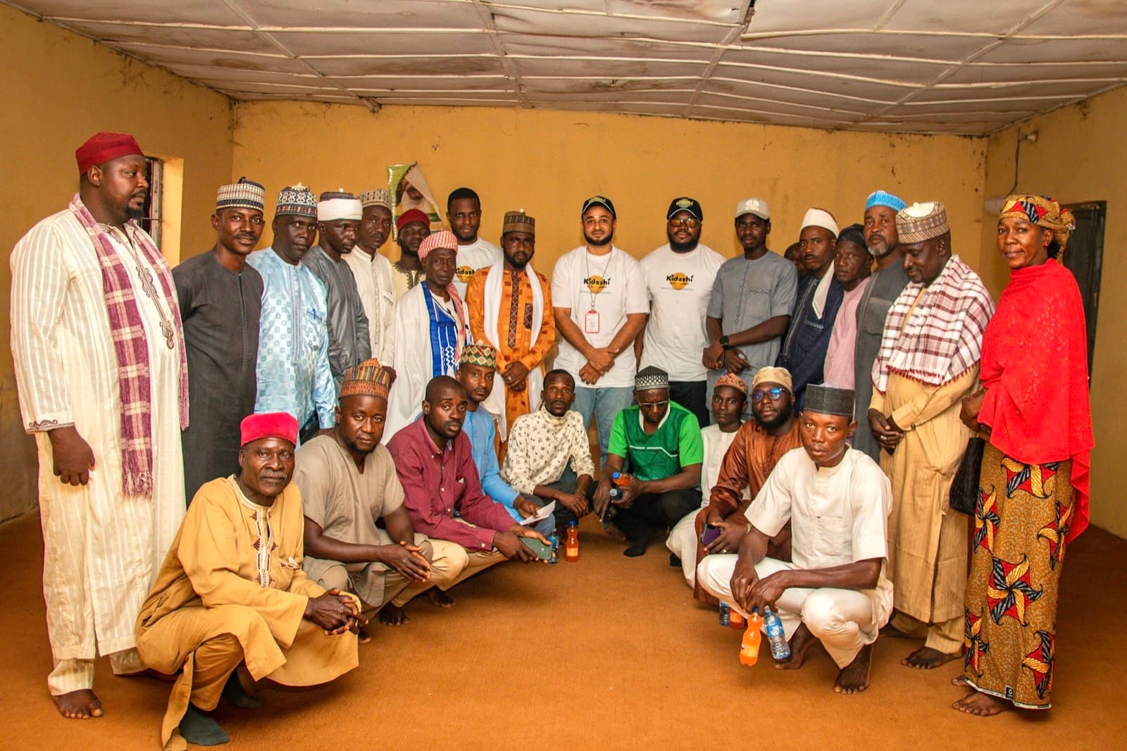 Community leaders and the Kidashi team together in Rigachikun